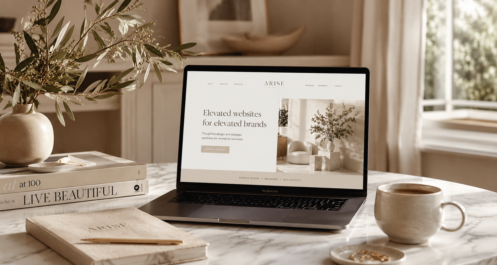 Website designer portfolio displayed on laptop beside branding materials for Tampa Florida business owners