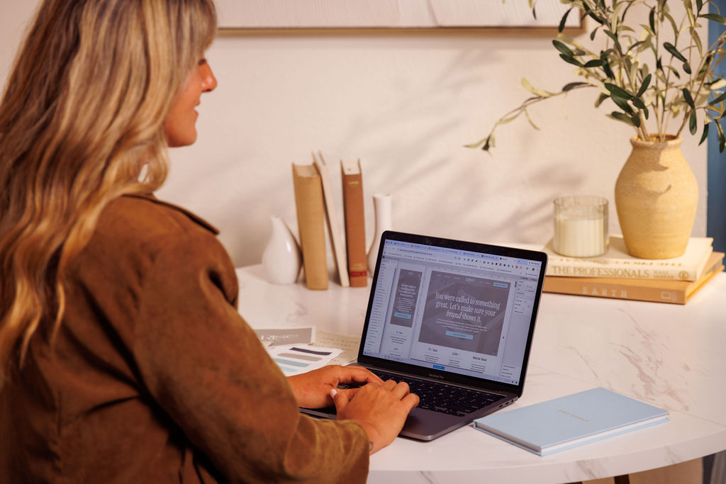 Airse design co artist working on website at desk